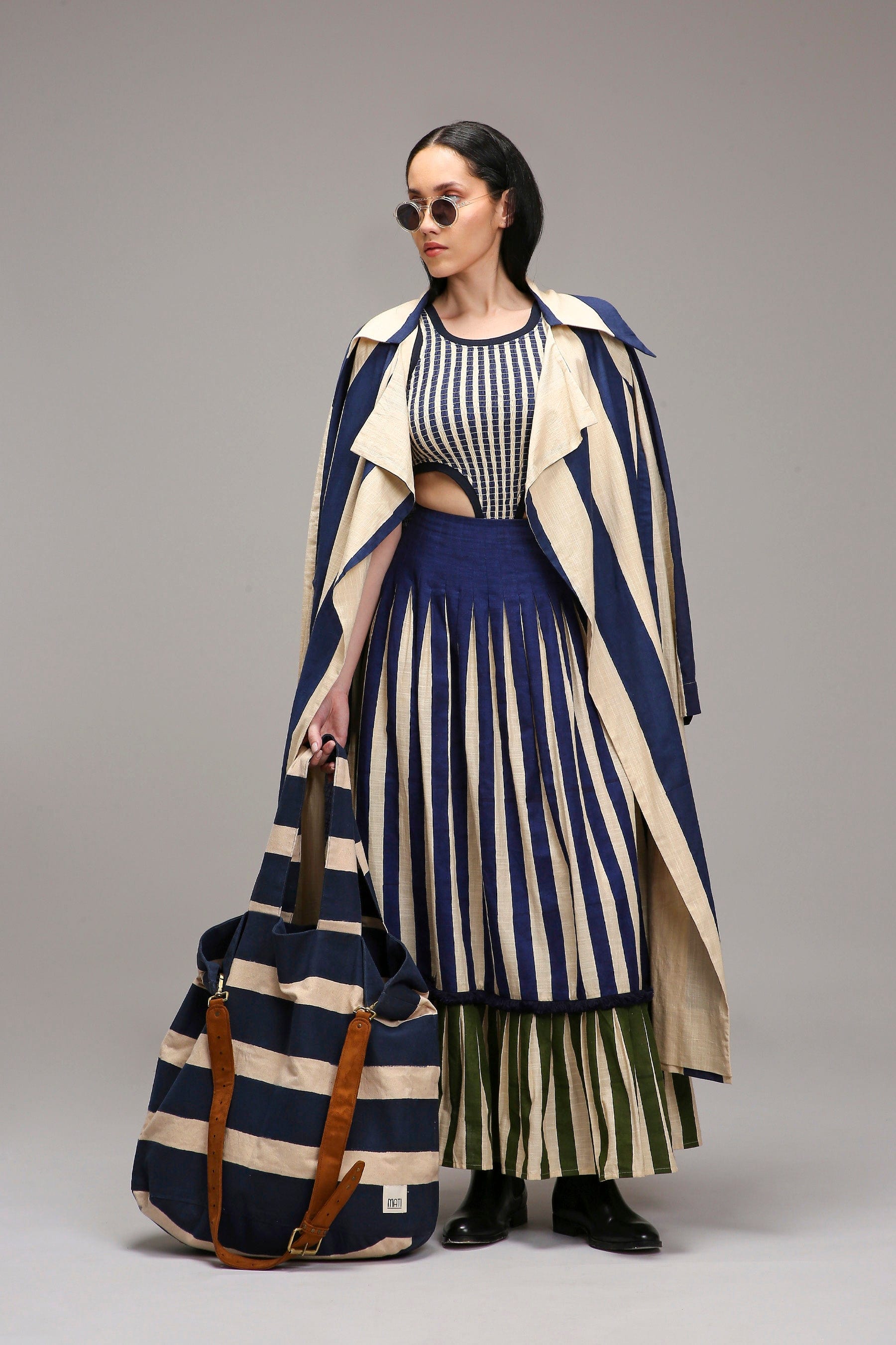 Handwoven cotton 3-piece co-ord set in Egg-Shell (Off-White) with dual striped skirt and smocked bodysuit by MATI India