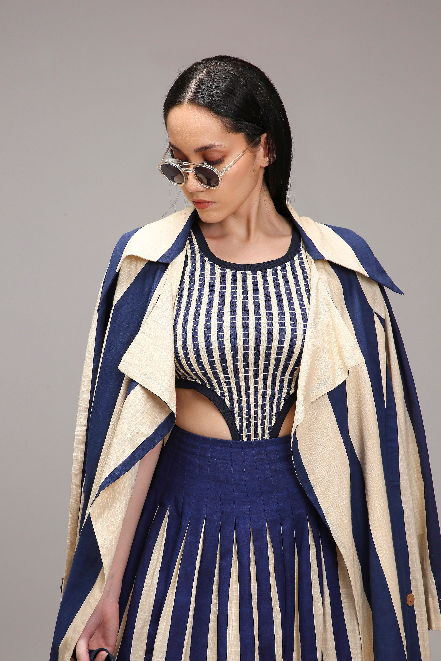 Handwoven cotton 3-piece co-ord set in Egg-Shell (Off-White) with dual striped skirt and smocked bodysuit by MATI India