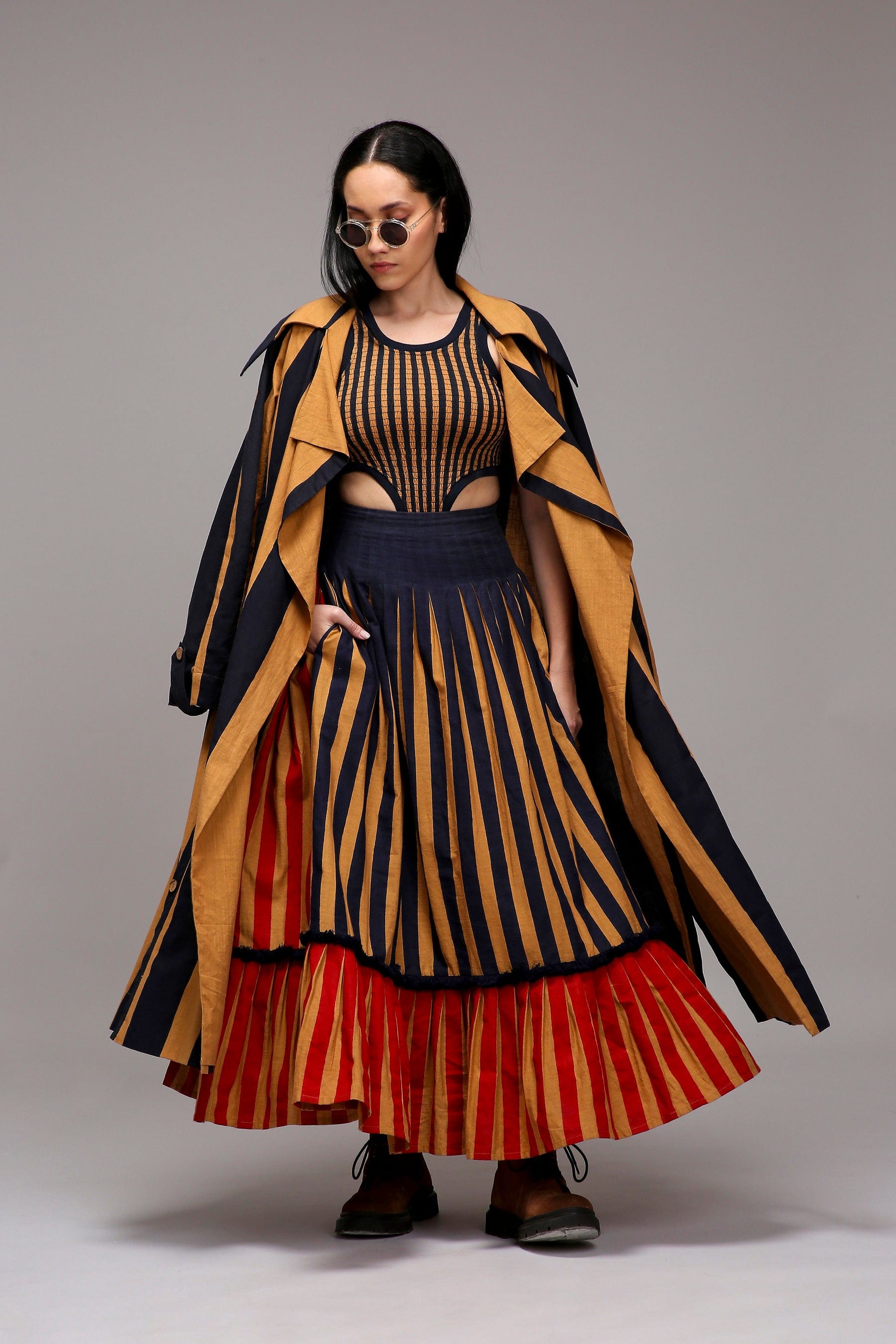 Handwoven cotton Tan-Brown (Brown) joker embroidery jacket and red blue striped pleated skirt co-ord set by MATI India