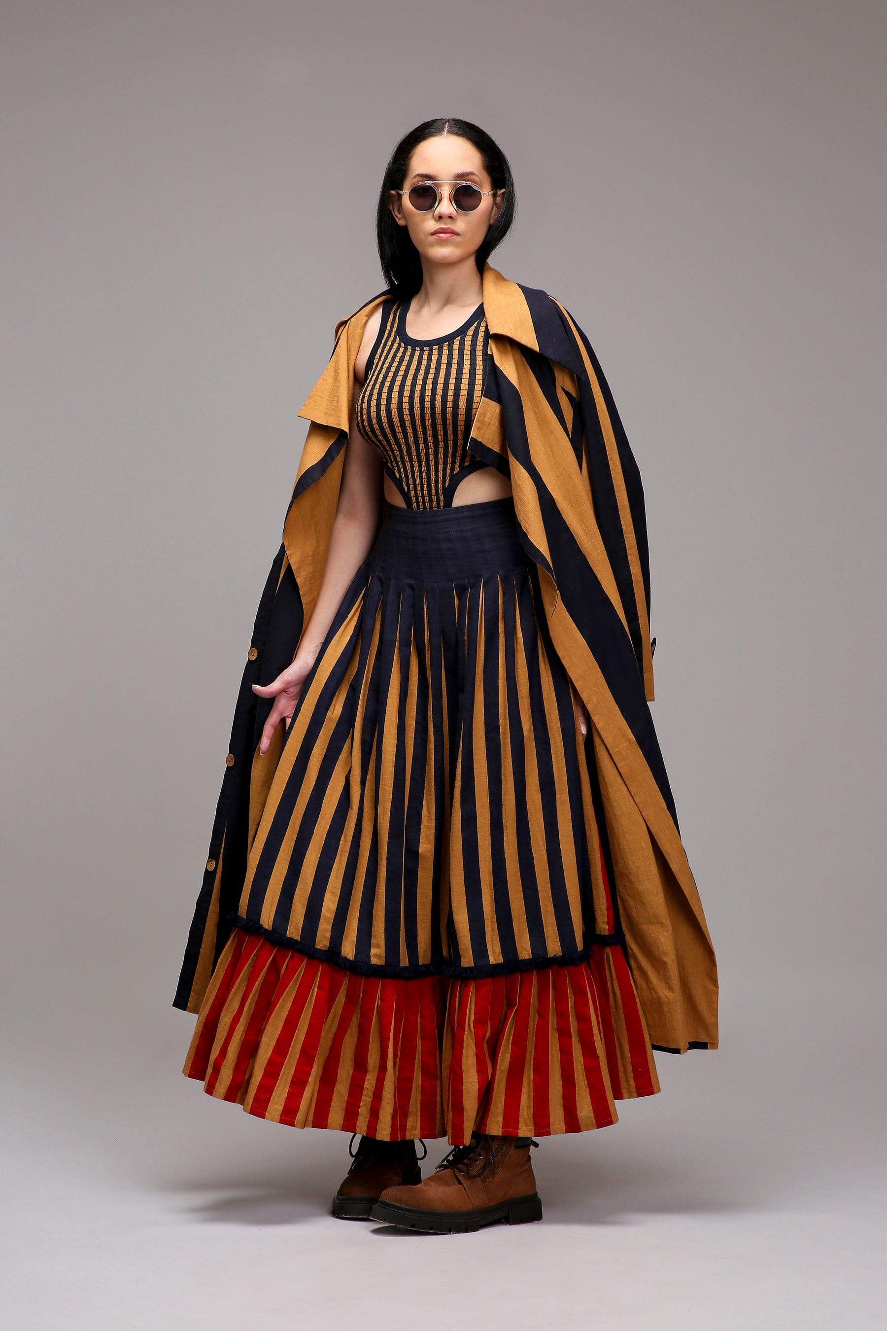 Handwoven cotton Tan-Brown (Brown) joker embroidery jacket and red blue striped pleated skirt co-ord set by MATI India