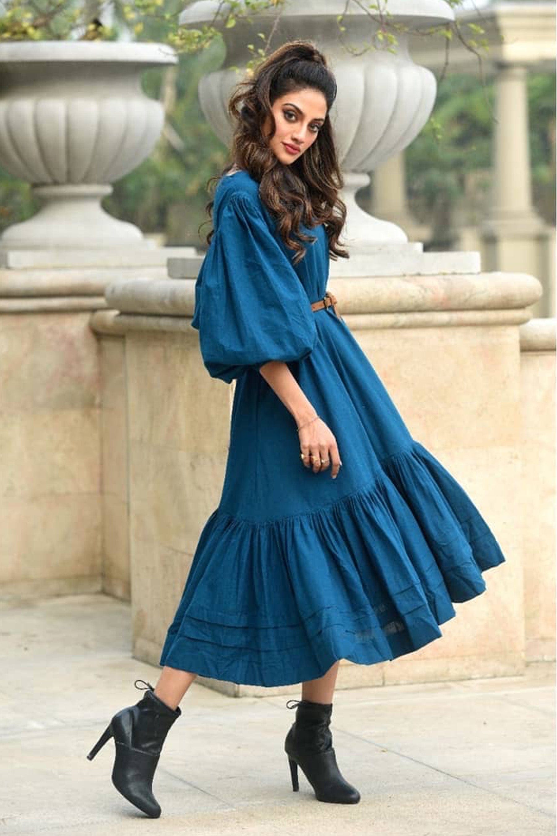 Styled shot of MATI Kaavya Blue Dress — oversized silhouette worn with boots