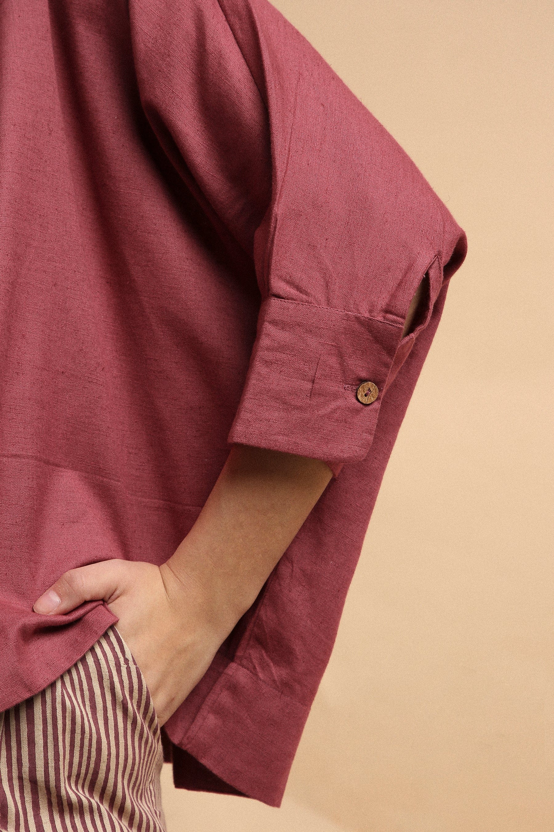Handspun cotton oversized shirt in mauve with mandarin collar and beige striped pleated shorts co-ord, by MATI India