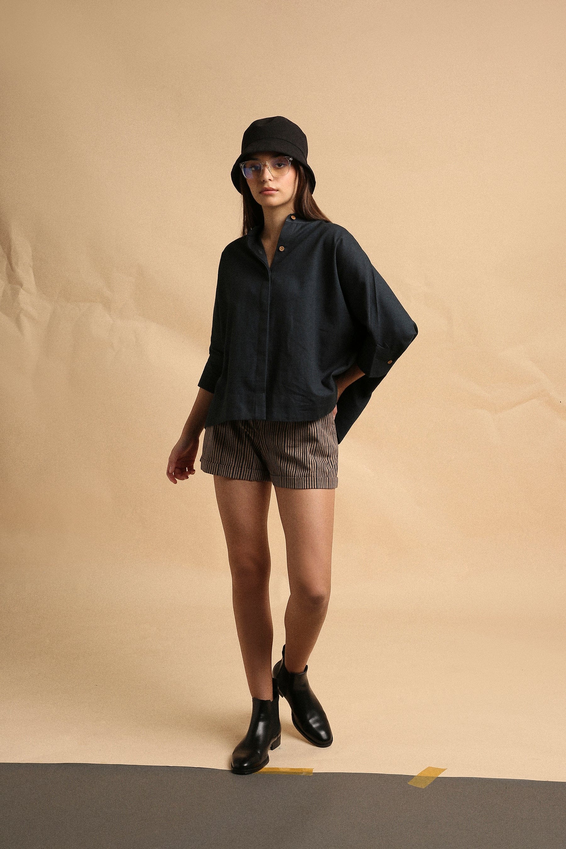 Handspun cotton anti-fit oversized shirt in charcoal with mandarin collar and full button opening, by MATI India