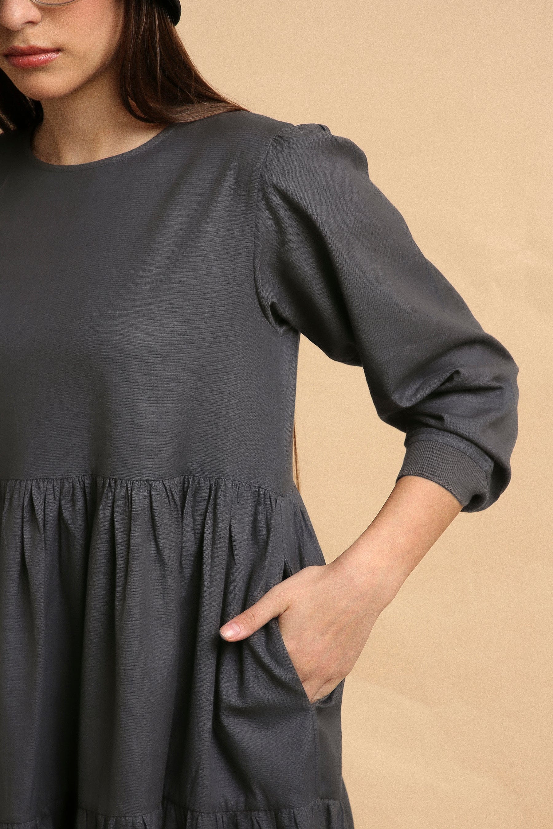 Handspun cotton tiered Vasara rib dress in ash gray with side pockets and wooden button opening, by MATI India
