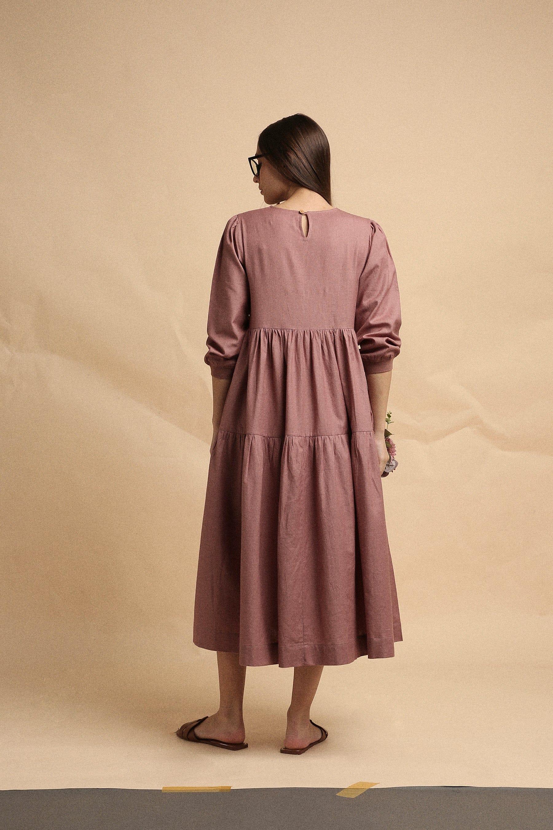Handspun cotton tiered Vasara rib dress in blush with side pockets and wooden button opening, by MATI India