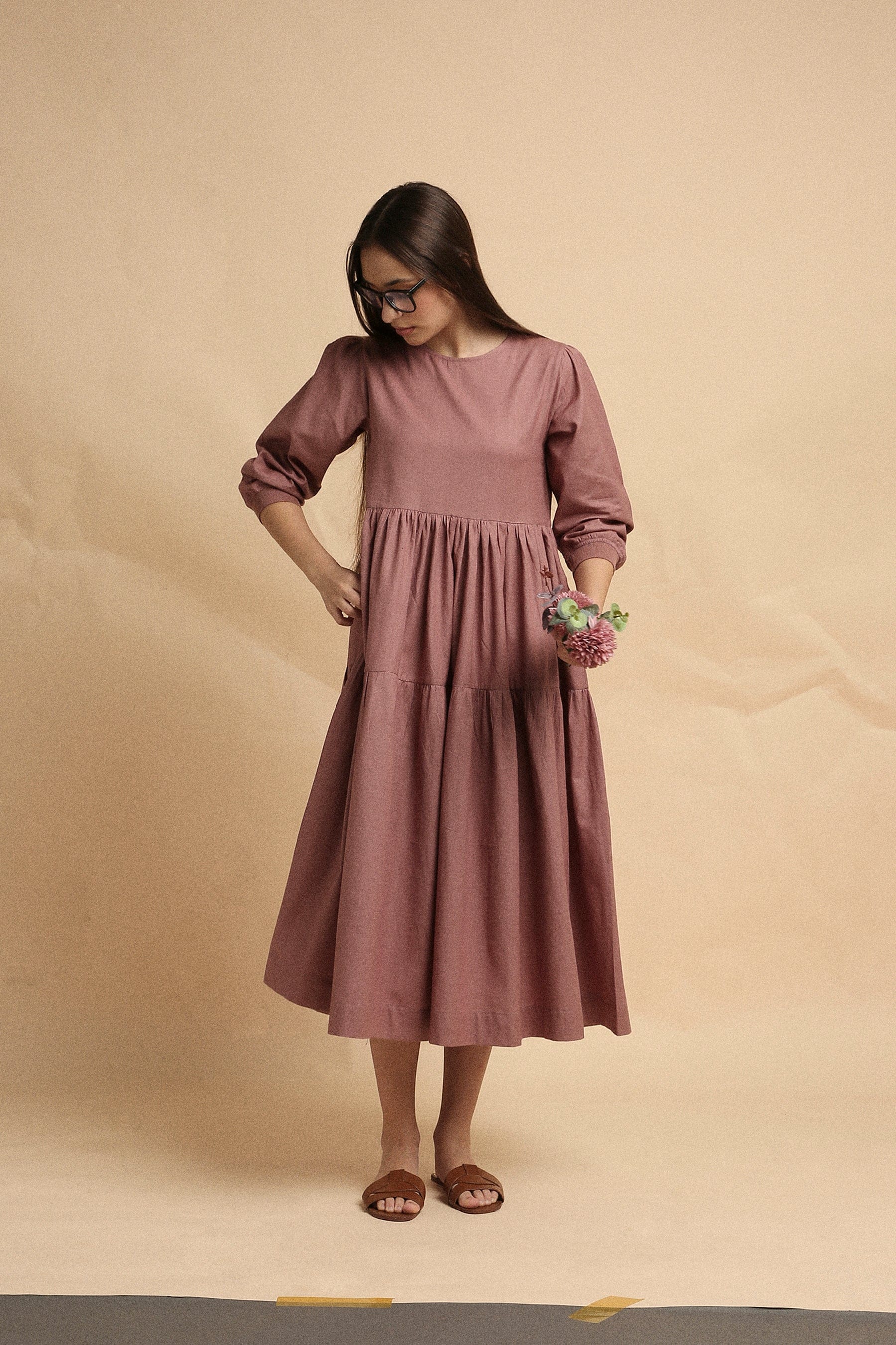 Handspun cotton tiered Vasara rib dress in blush with side pockets and wooden button opening, by MATI India