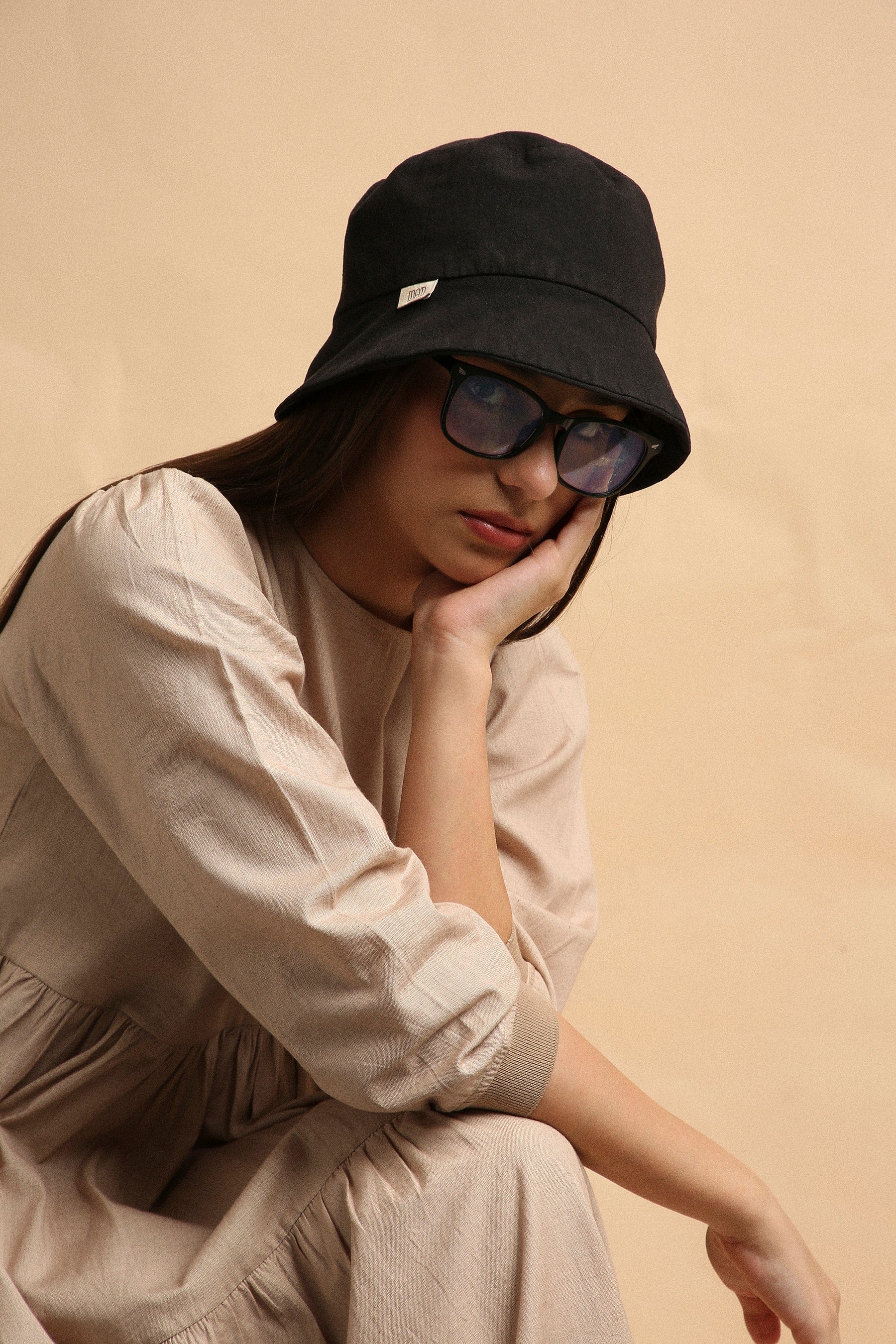 Handspun cotton tiered Vasara rib dress in sand with side pockets and wooden button opening, by MATI India