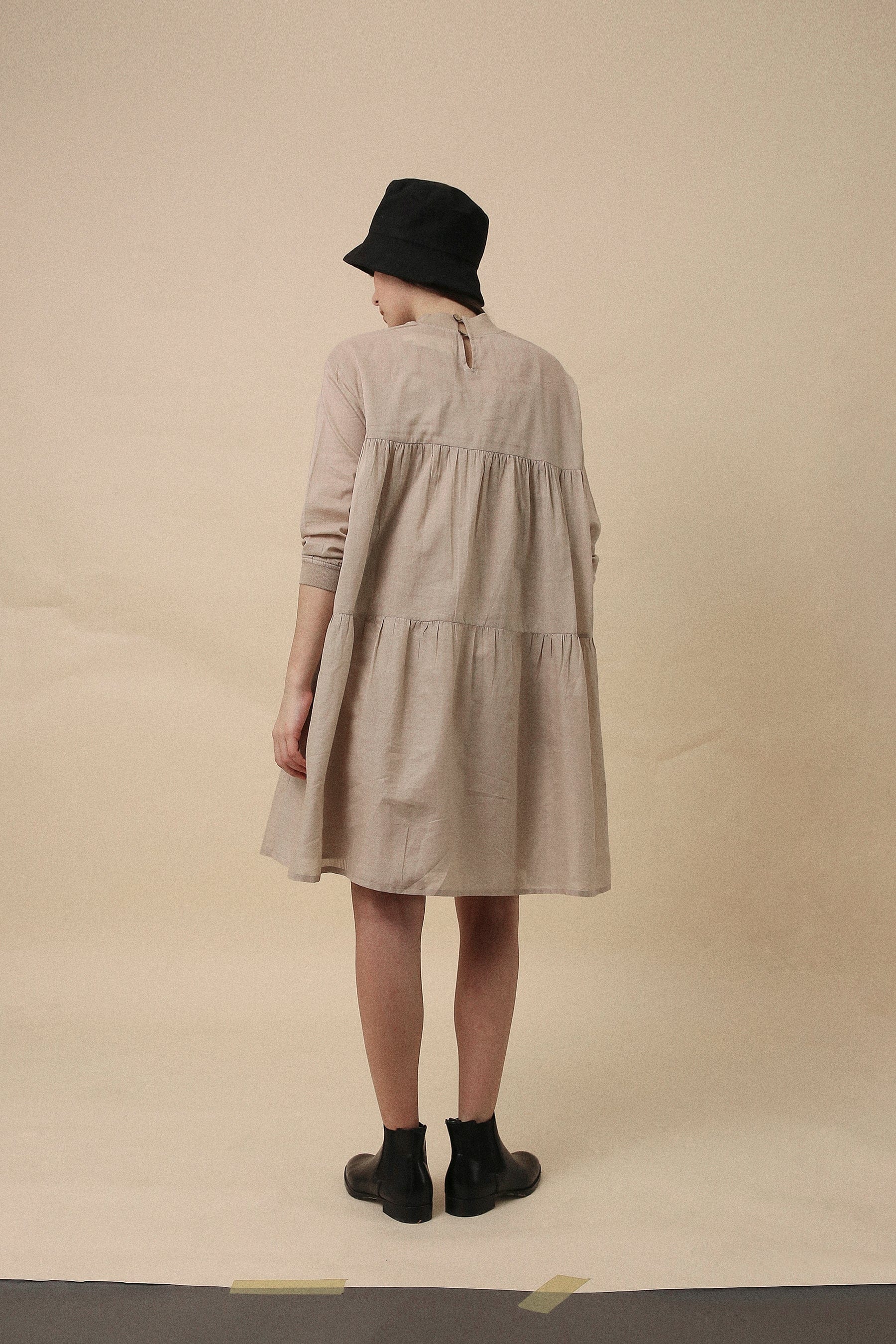 Back button opening and rib sleeve edge detail on sand handwoven cotton maxi dress – MATI