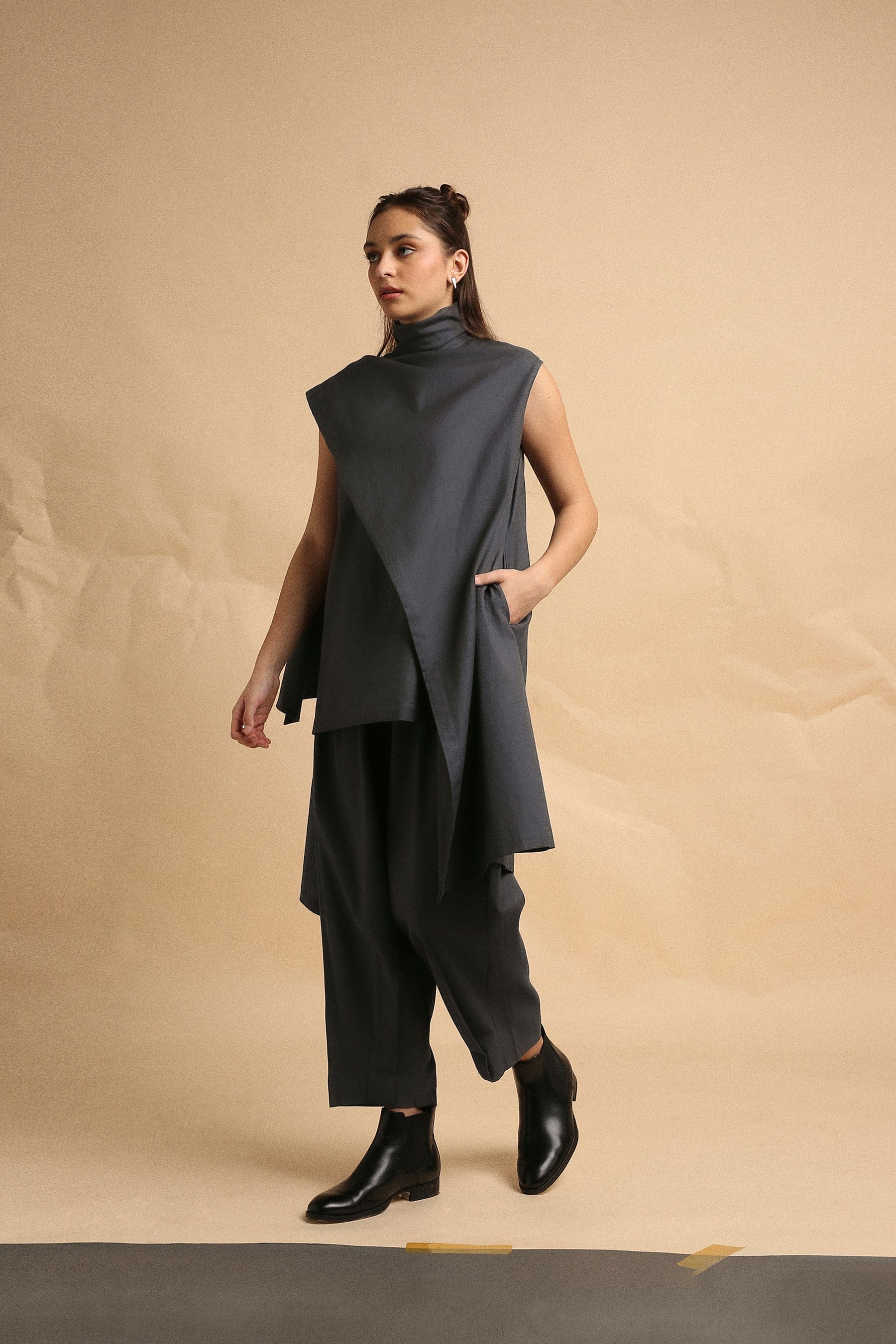 Handwoven cotton Toga tunic and pleated pants co-ord set in ash grey with high-low hem and turtle neck, by MATI India