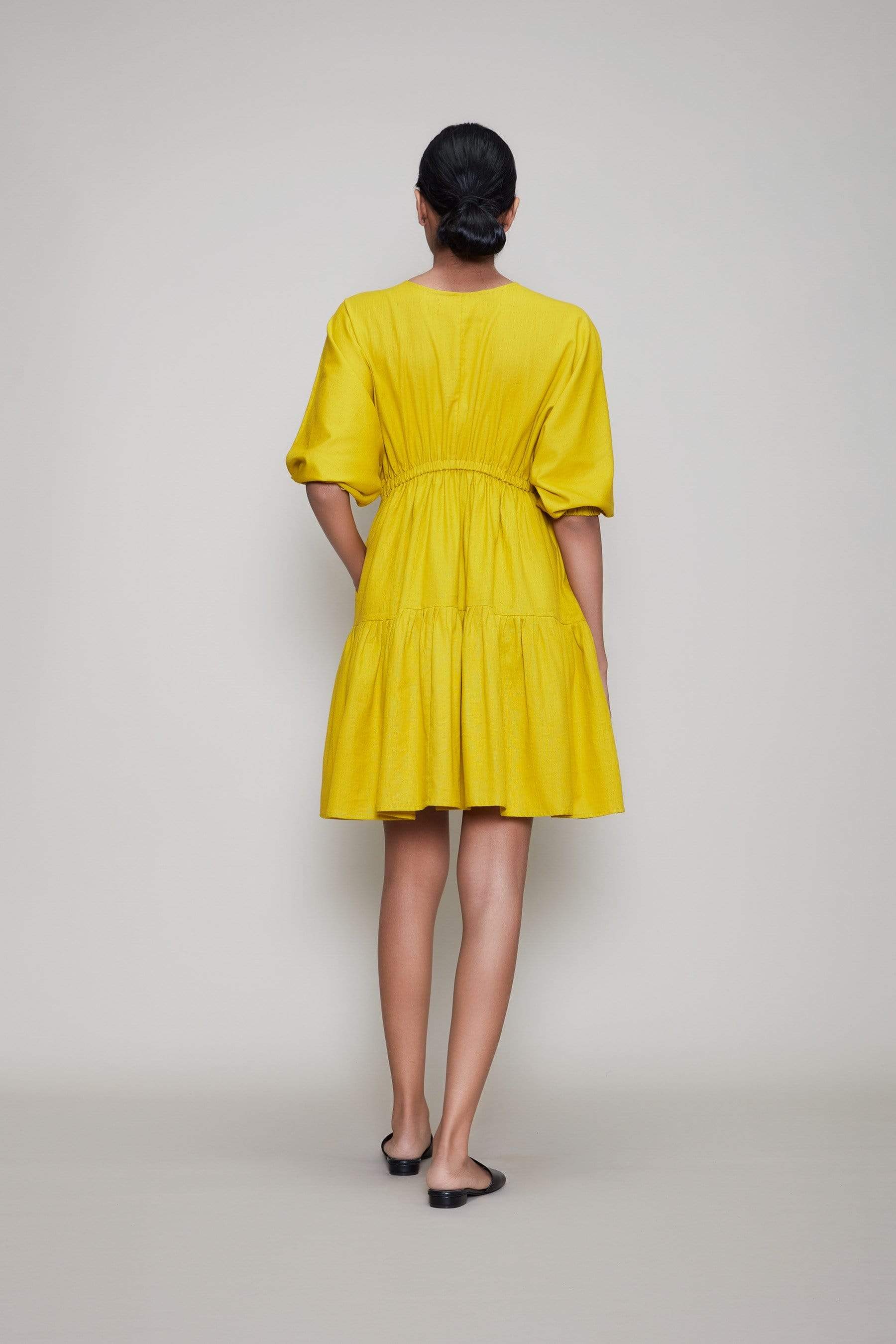 Handwoven cotton short tiered dress in yellow with Azo-free dye, side pockets and drawstring waist, by MATI India