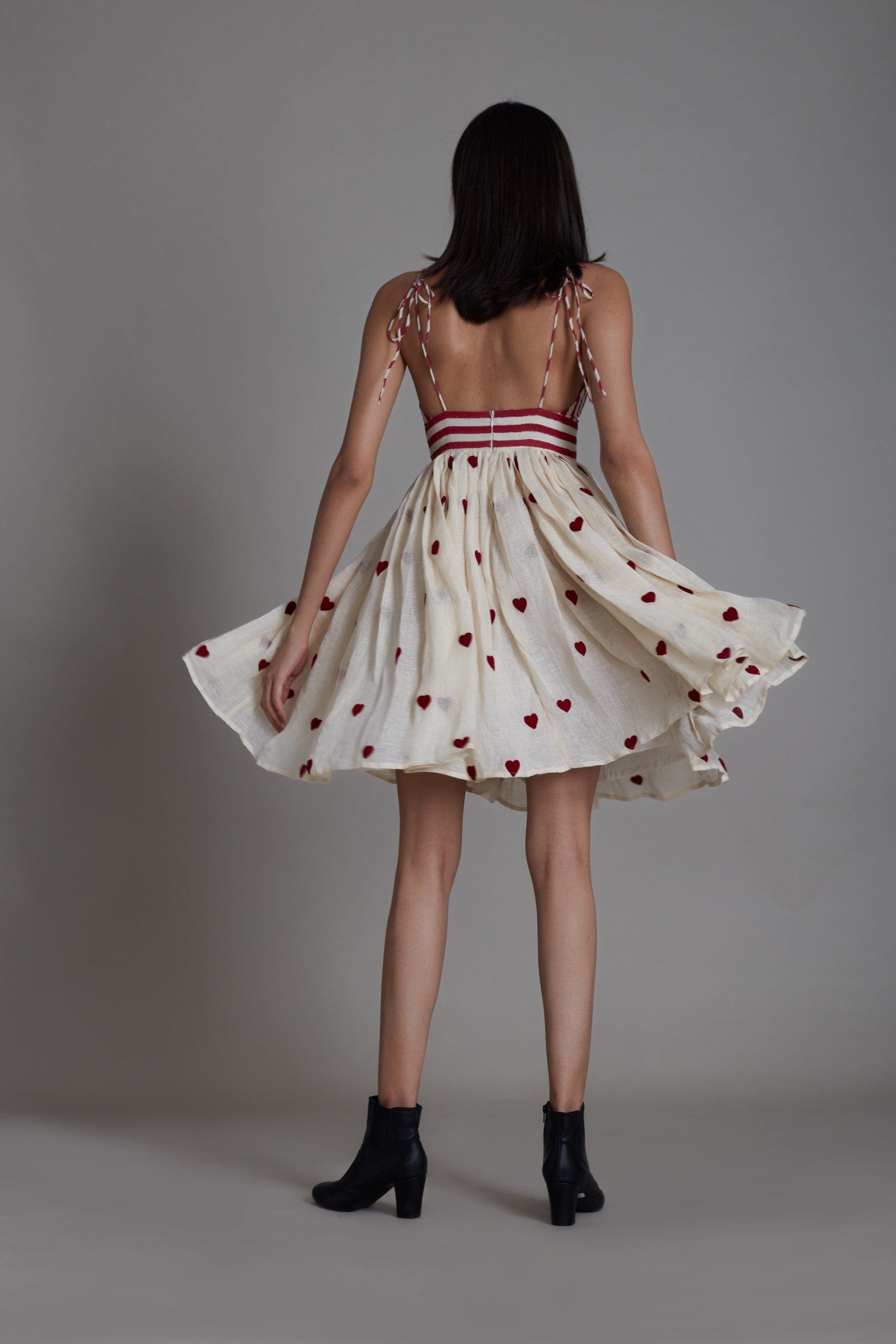 Handwoven linen and cotton embroidered dress in oatmeal with heart motifs and hand block print, by MATI India