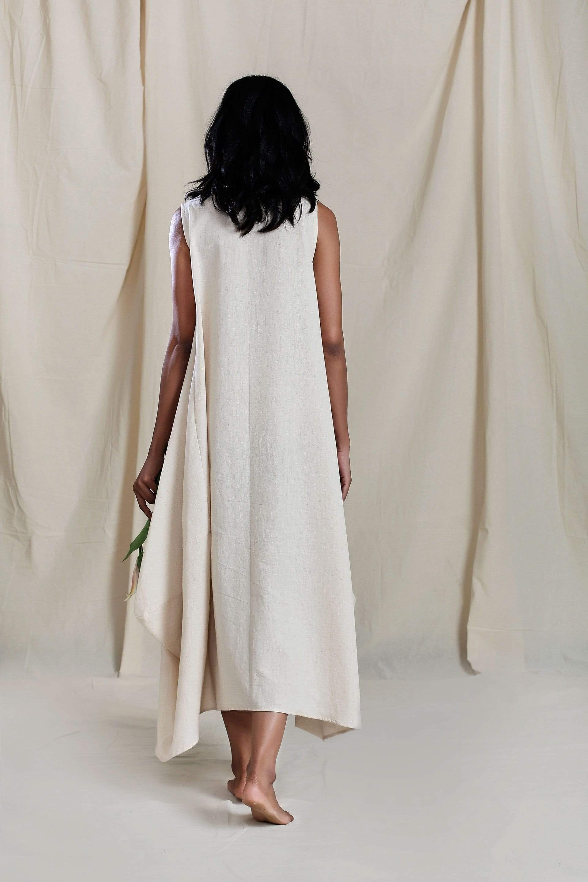 Handwoven cotton side cowl dress in oatmeal with boatneck and asymmetric hem, by MATI India