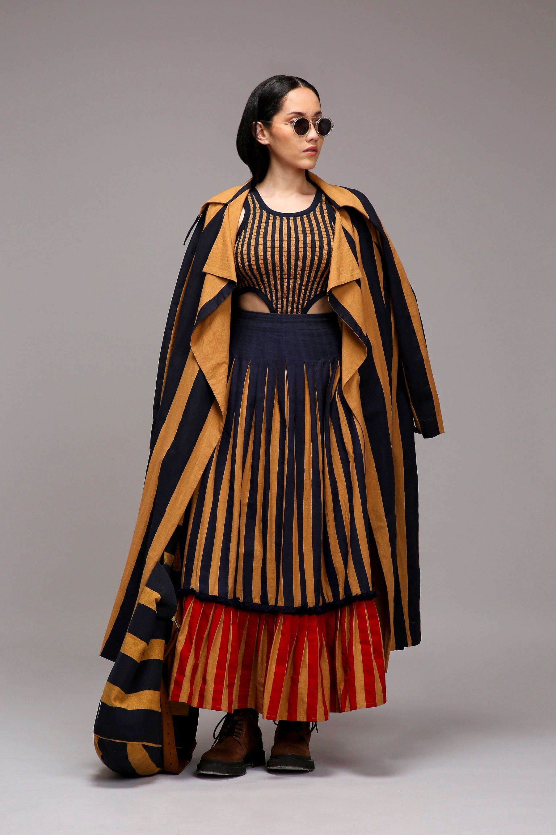 Handwoven cotton Tan-Brown (Brown) joker embroidery jacket and red blue striped pleated skirt co-ord set by MATI India
