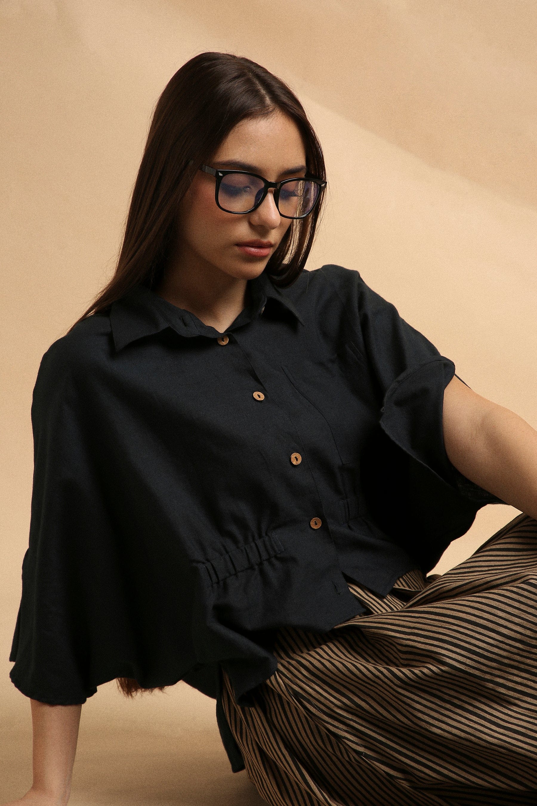 Handspun cotton anti-fit collar crop top in charcoal with front button opening, collar neckline and sleeve slit, by MATI India