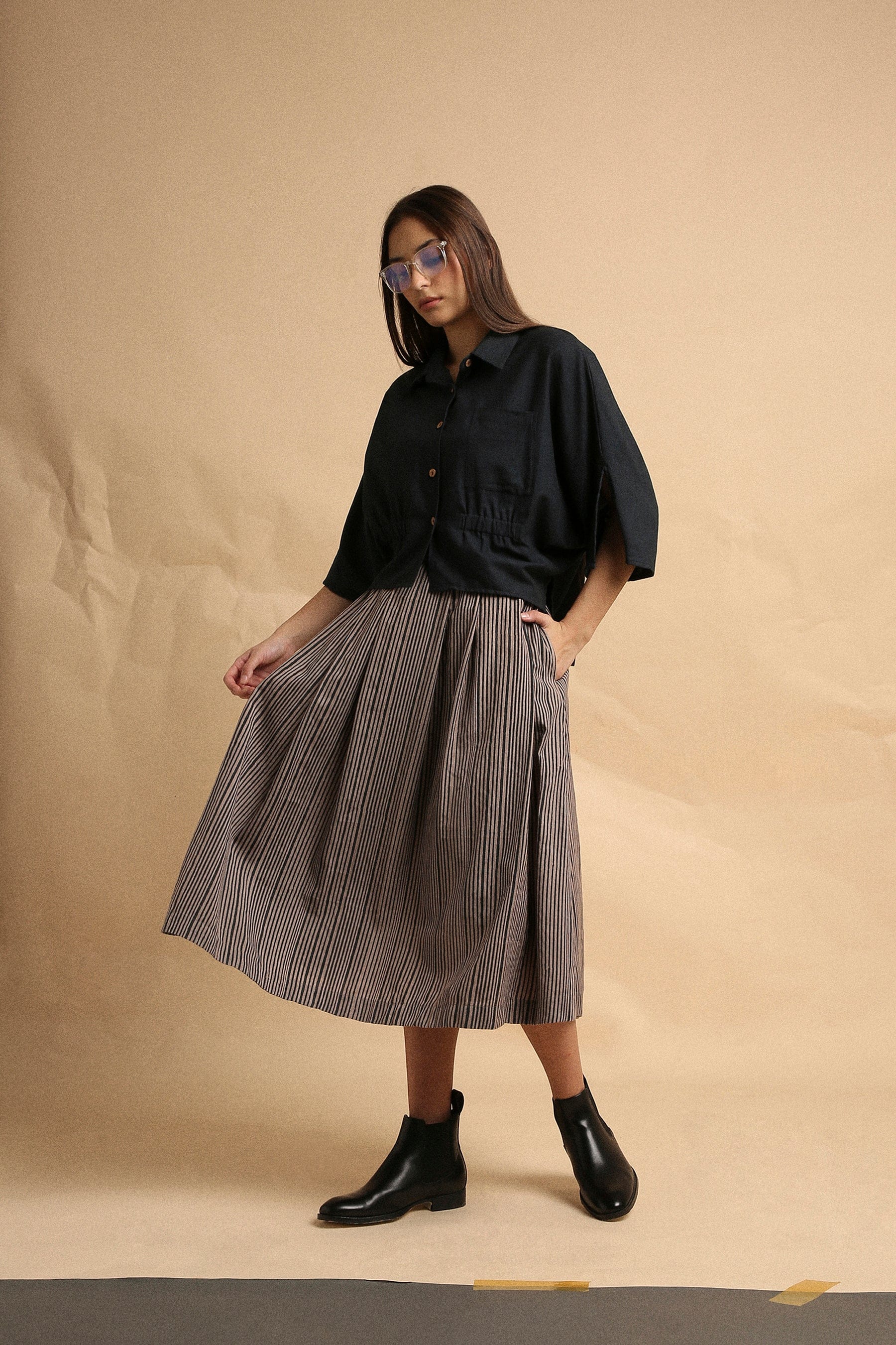 Handspun cotton anti-fit collar crop top in charcoal with front button opening, collar neckline and sleeve slit, by MATI India