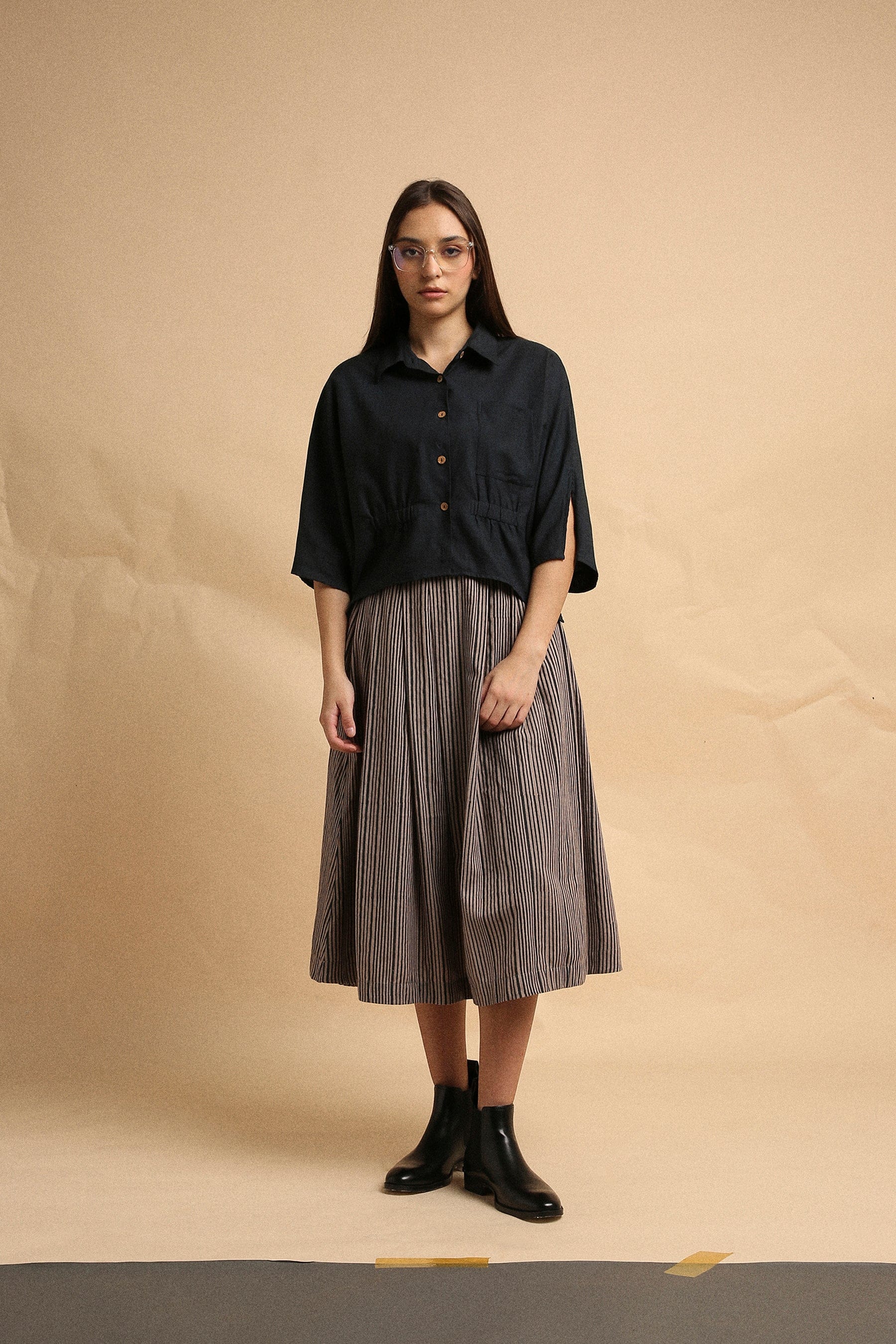 Handspun cotton anti-fit collar crop top in charcoal with front button opening, collar neckline and sleeve slit, by MATI India