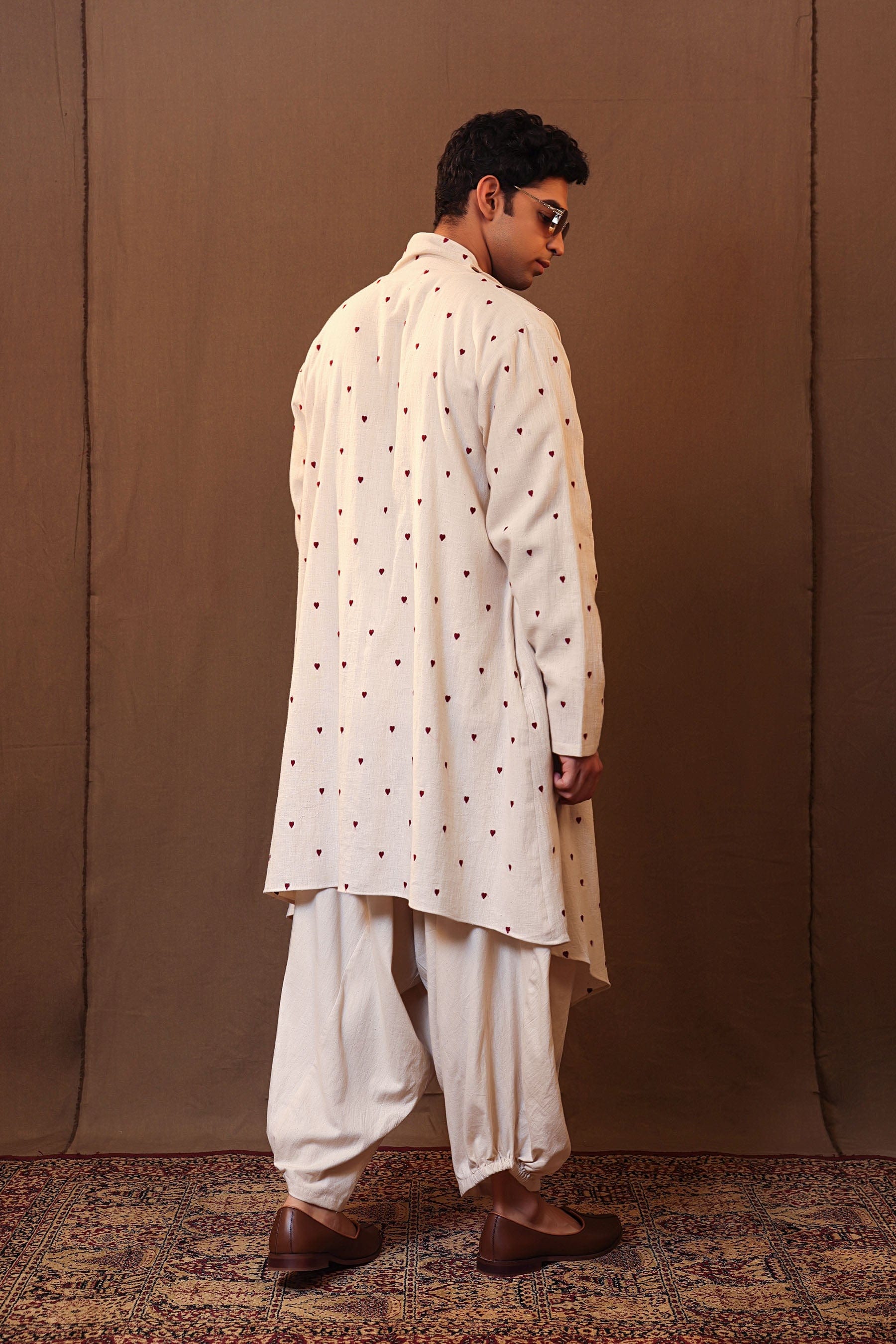 Styled back view of off-white 3-piece embroidered cotton set by MATI