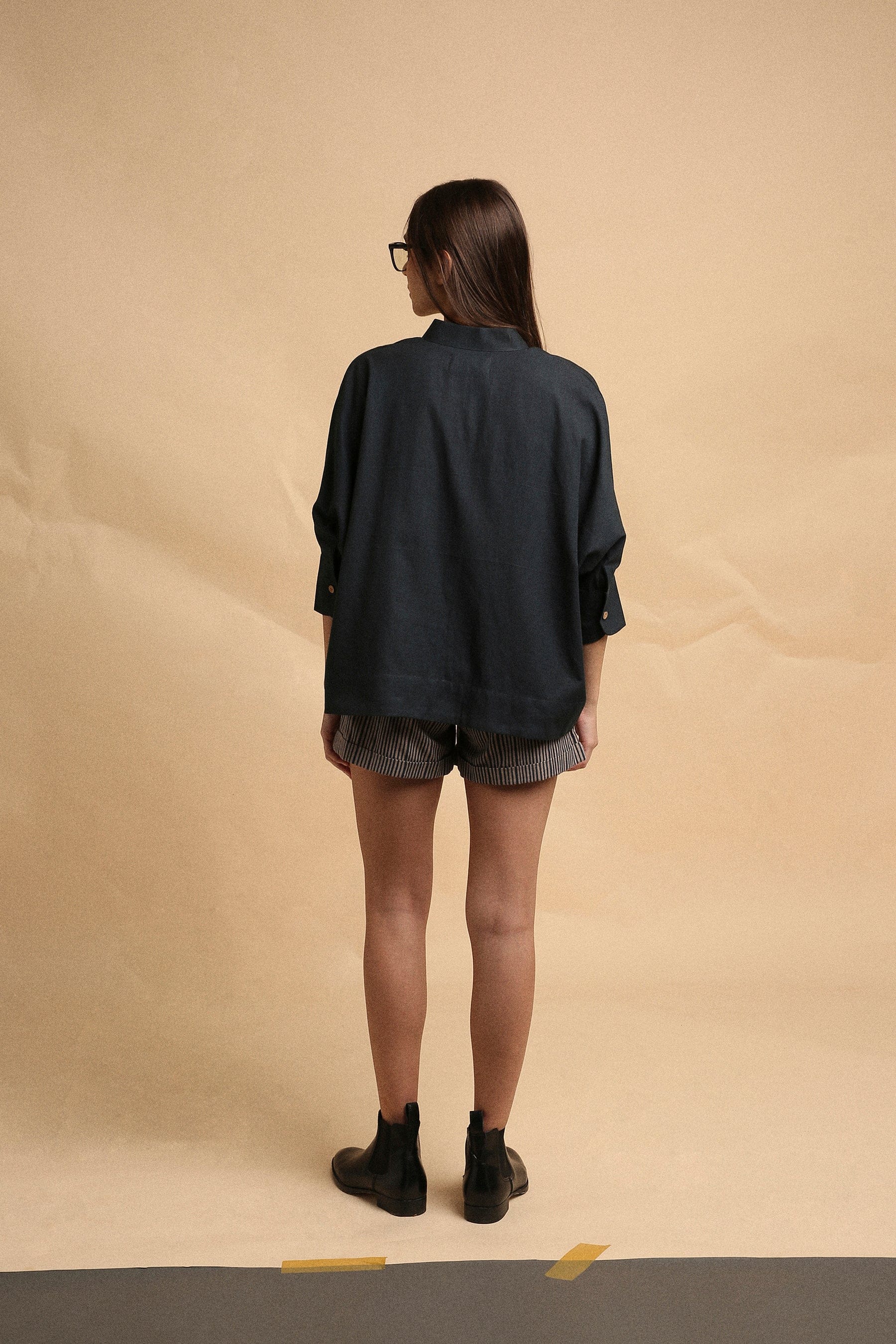 Handspun cotton anti-fit oversized shirt in charcoal with mandarin collar and full button opening, by MATI India