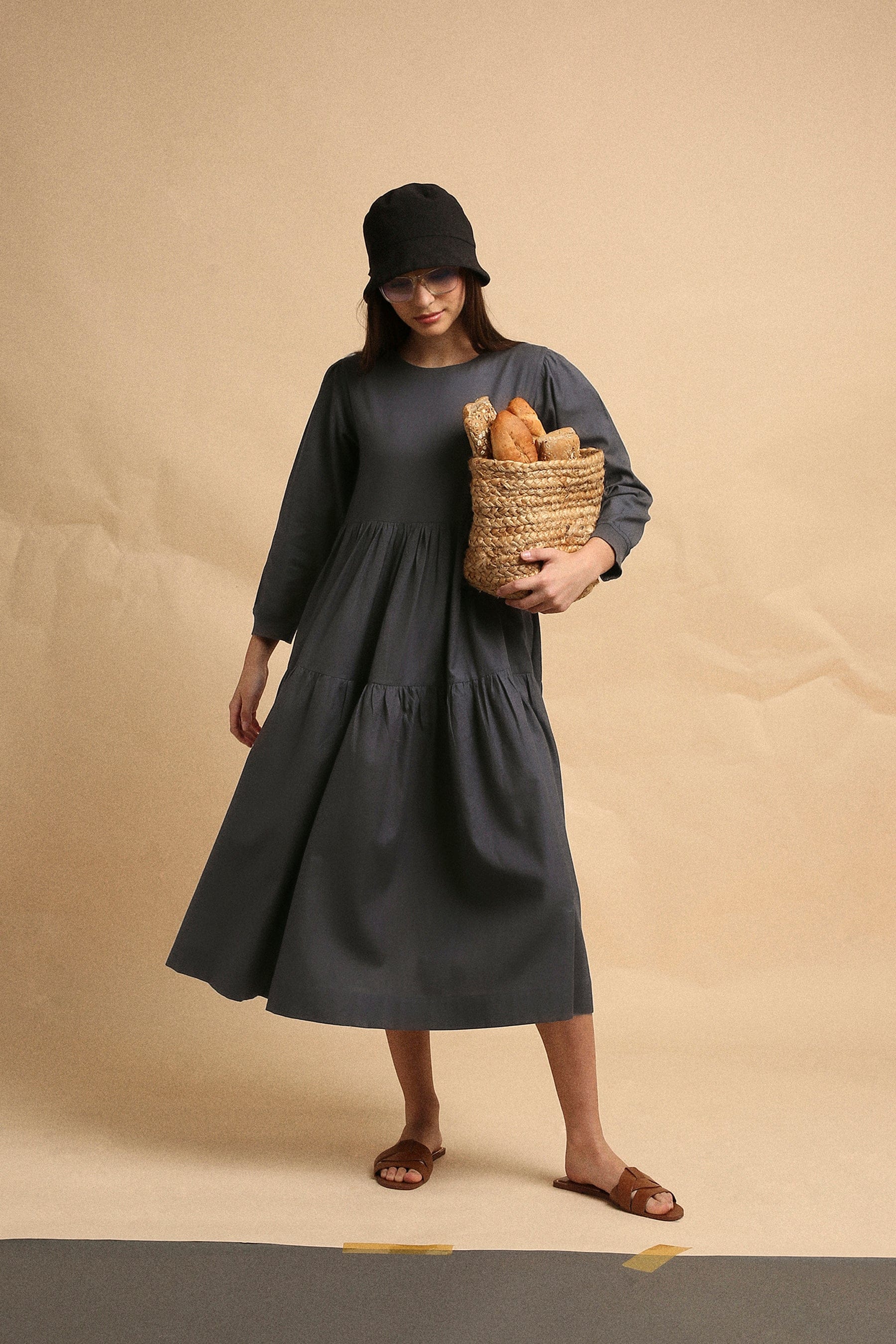 Handspun cotton tiered Vasara rib dress in ash gray with side pockets and wooden button opening, by MATI India