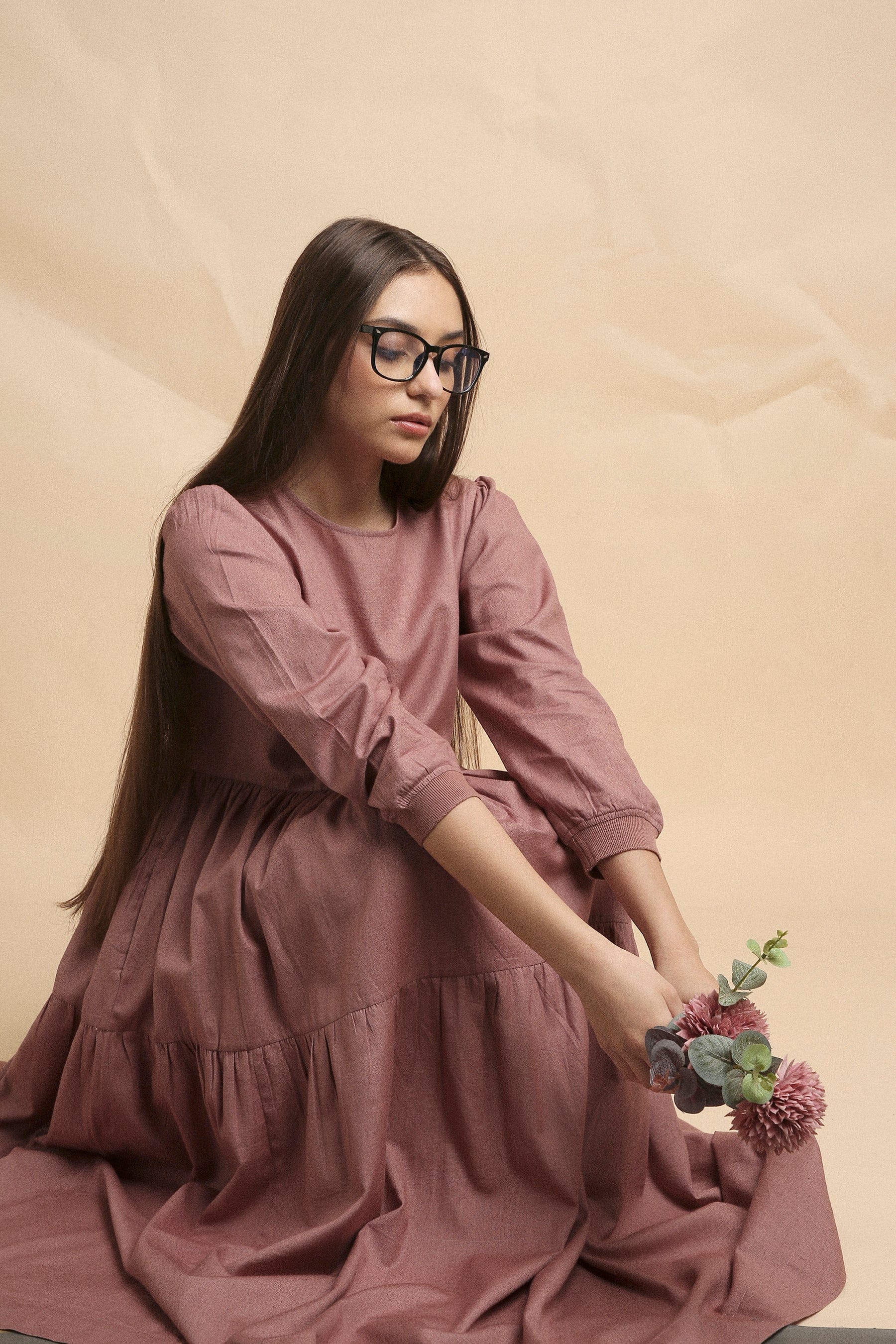 Handspun cotton tiered Vasara rib dress in blush with side pockets and wooden button opening, by MATI India