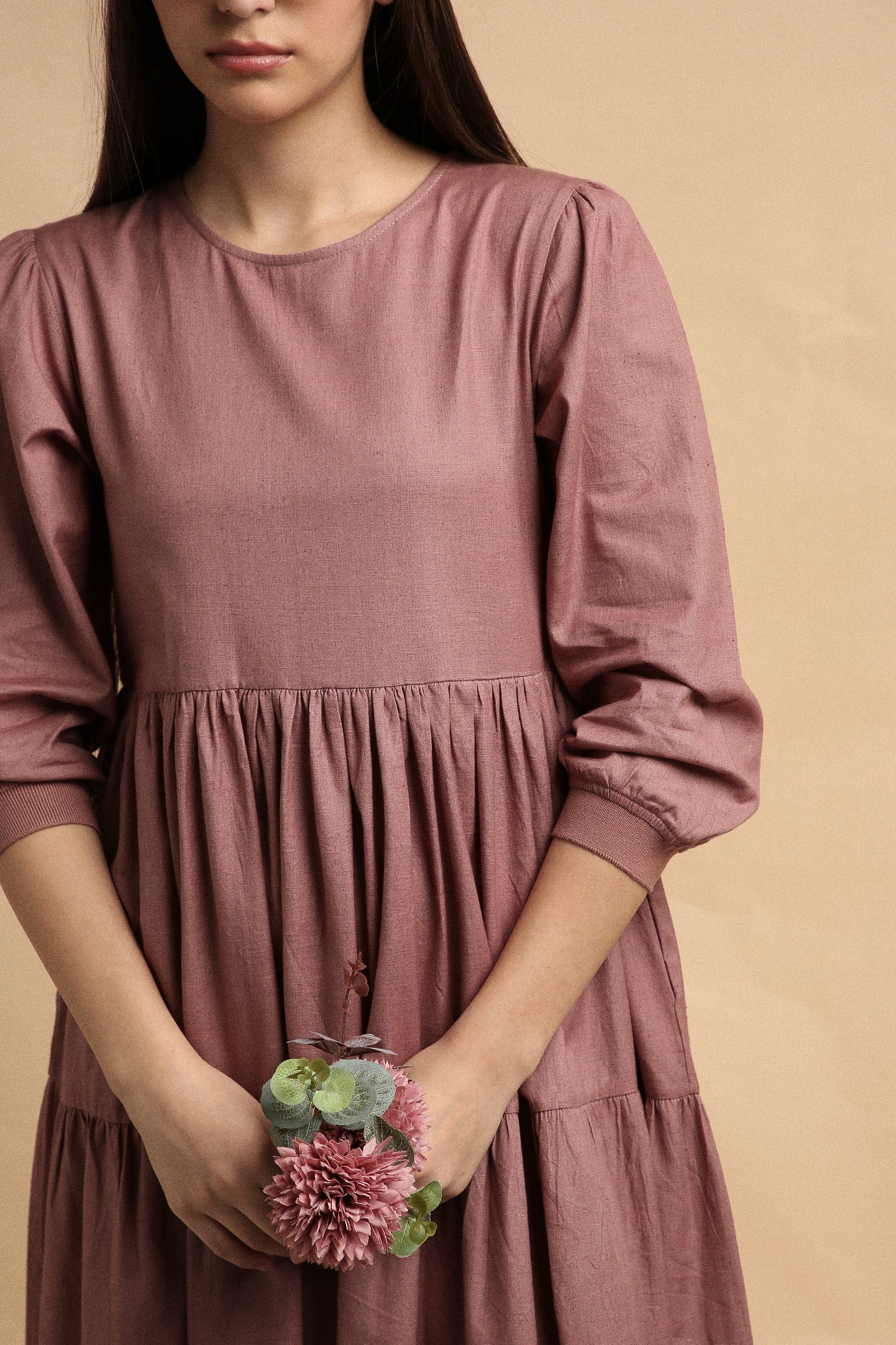 Handspun cotton tiered Vasara rib dress in blush with side pockets and wooden button opening, by MATI India