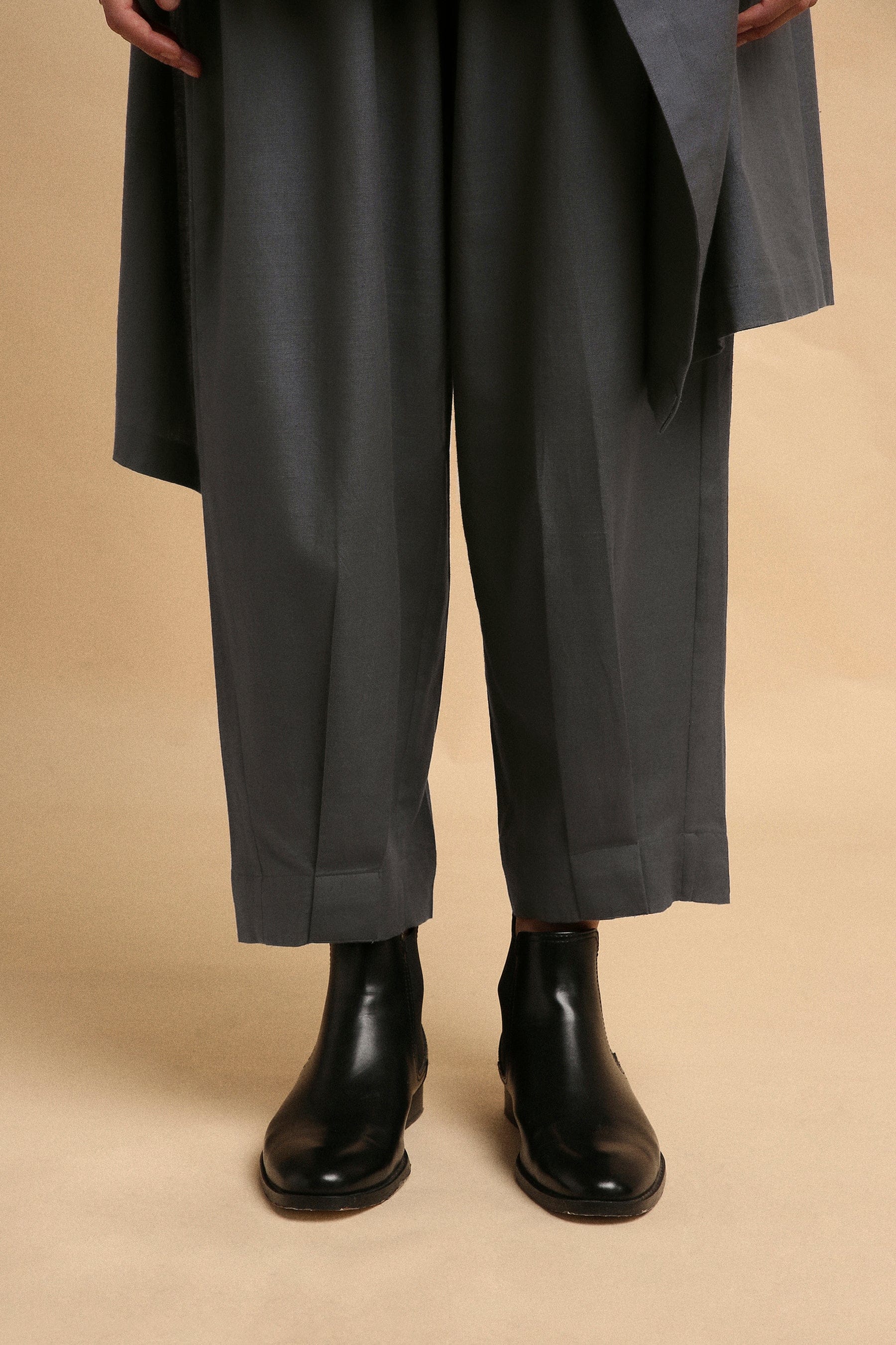 Handwoven cotton Toga tunic and pleated pants co-ord set in ash grey with high-low hem and turtle neck, by MATI India