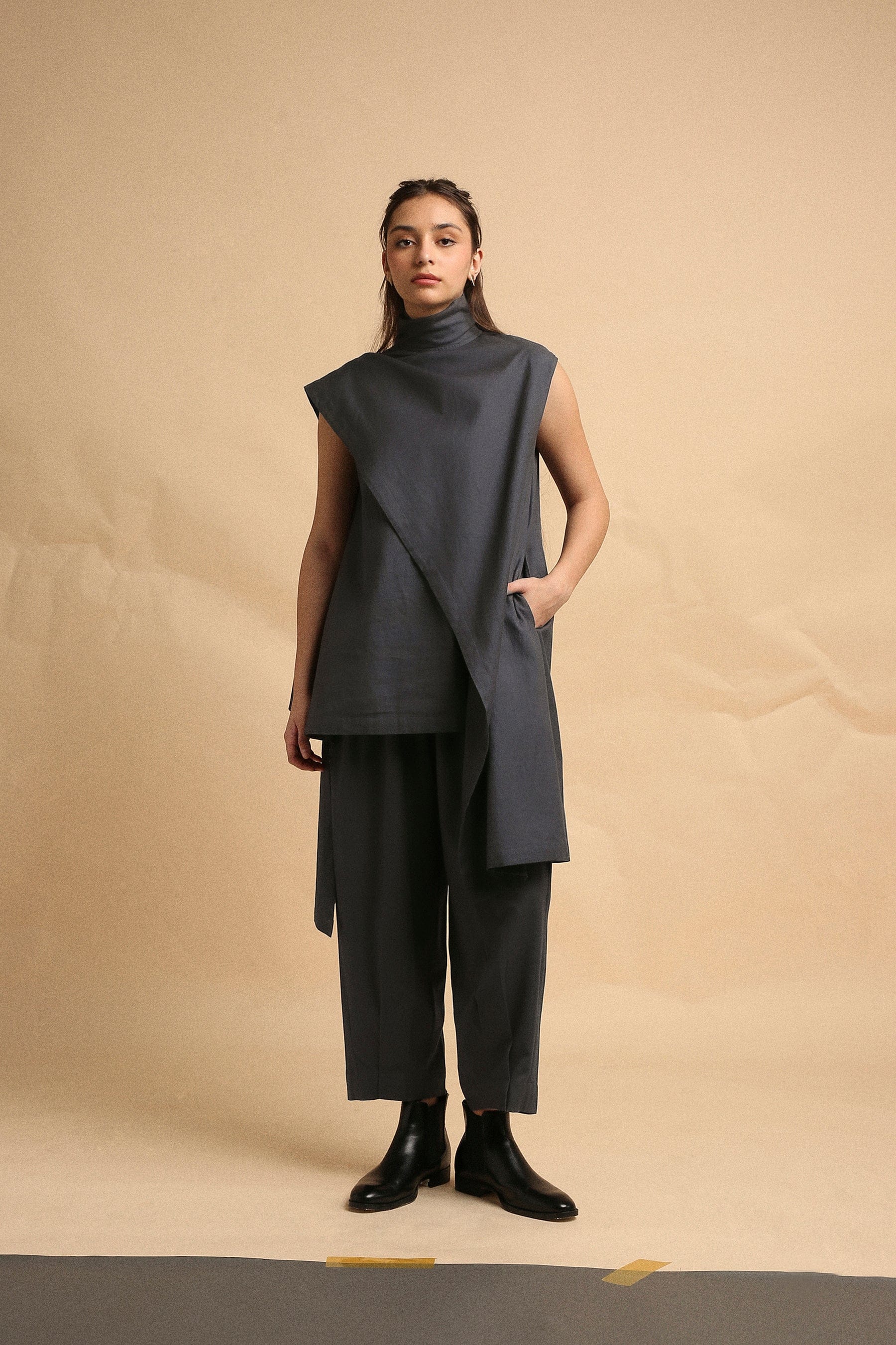Handwoven cotton Toga tunic and pleated pants co-ord set in ash grey with high-low hem and turtle neck, by MATI India