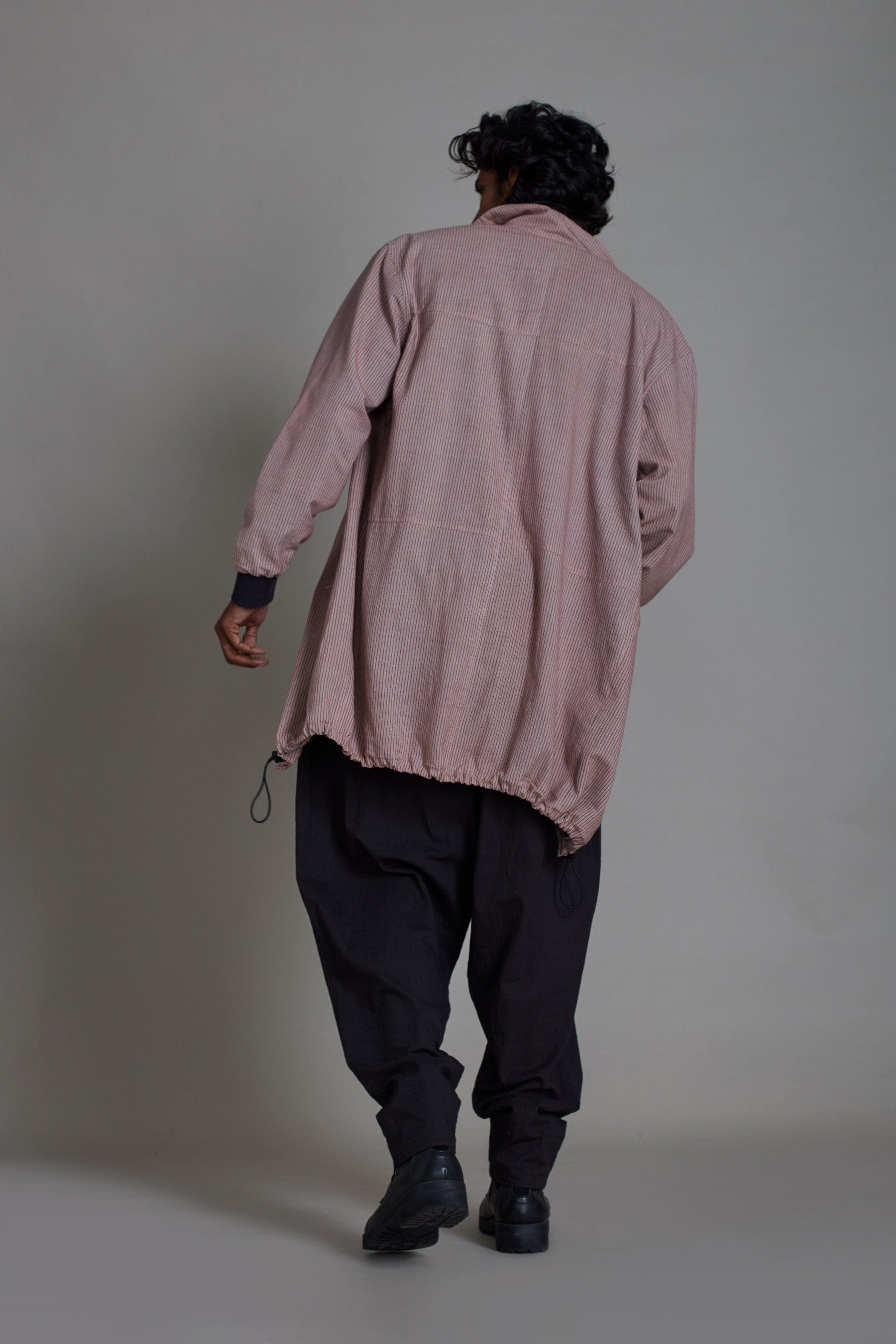 Back view of pink handwoven cotton men's co-ord set by MATI