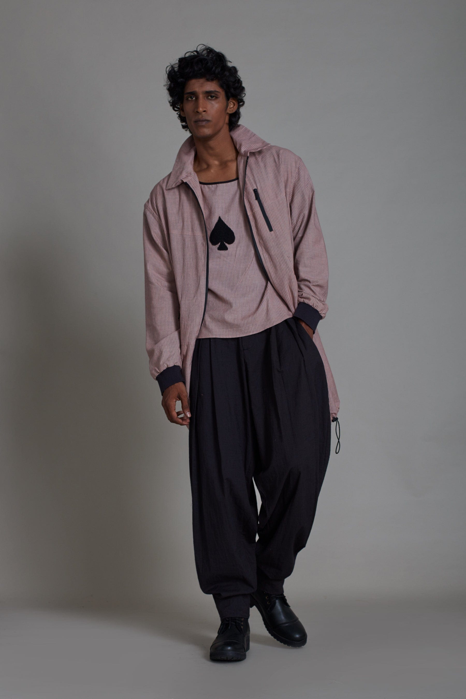 Lifestyle shot of MATI Black Jack men's co-ord set in pink — slow fashion India