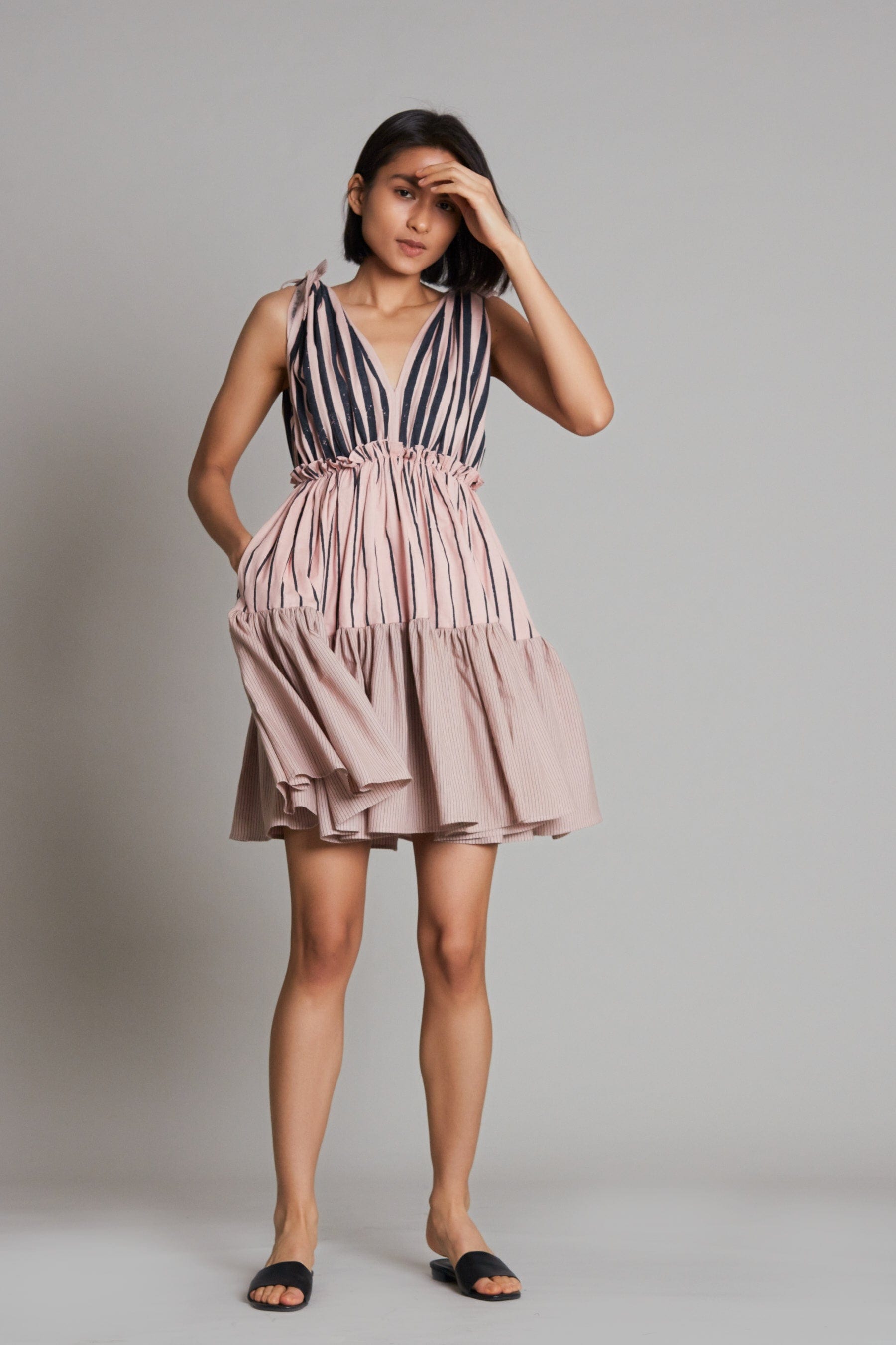 Handwoven cotton striped tiered frill midi dress in pink with Azo-free dye, by MATI India. Size inclusive XS to 7XL, worldwide shipping.